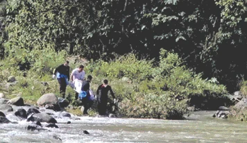 Encuentran cuerpo en estado de descomposición a orillas del río Yaque del Norte en Jarabacoa