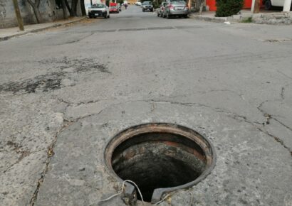 Joven se lanza a una alcantarilla en Villa Juana; sufrió heridas leves