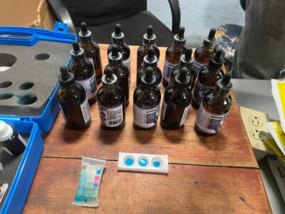 DNCD incauta 15 frascos de gotas para el pelo con cocaína líquida en AILA