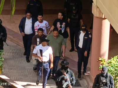 Bajo estricta vigilancia trasladan a imputados por asesinato de chofer en Santiago