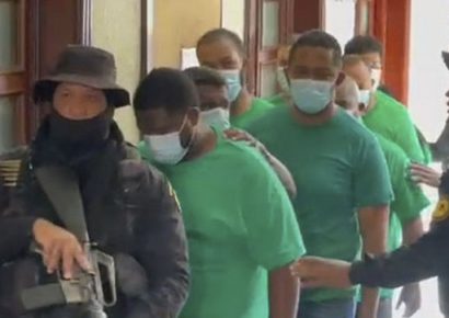 Dictan un año de prisión preventiva a red que estafó al Banco BHD