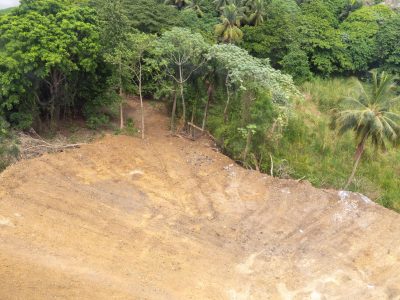 Procuraduría investiga relleno ilegal en el río Ozama